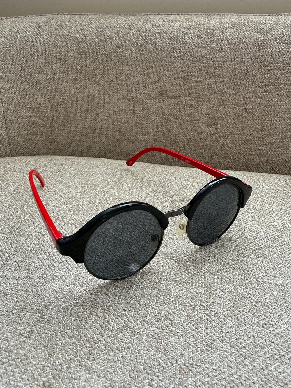 Anthropologie Black Round Sunglasses with Red Temples
